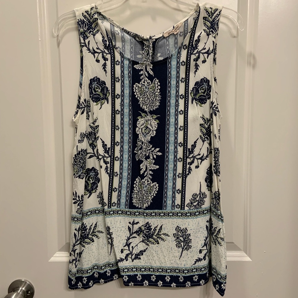 Soirée navy blue and white flowy tank with buttons down the back. Size M